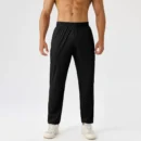 Prodyšné tepláky slim fit - černé